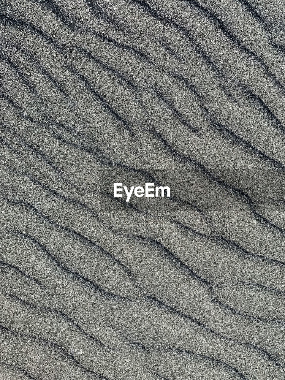 FULL FRAME SHOT OF TEXTURED PATTERN ON SAND