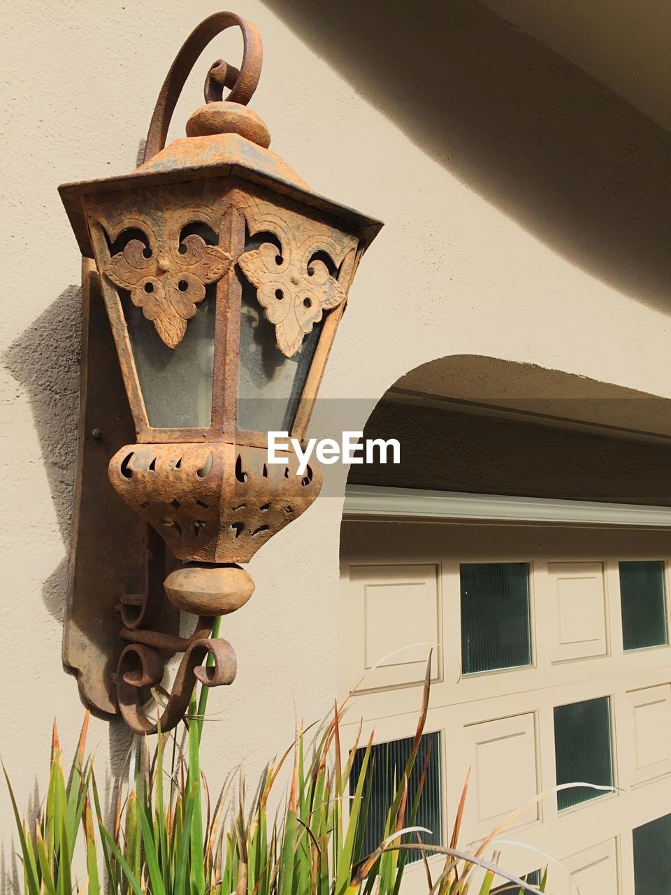 hanging, low angle view, architecture, no people, built structure, day, building exterior, outdoors, lantern, close-up