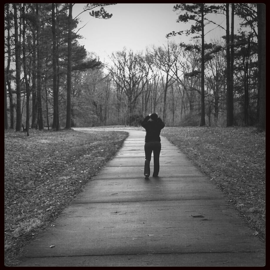 PEOPLE WALKING ON ROAD