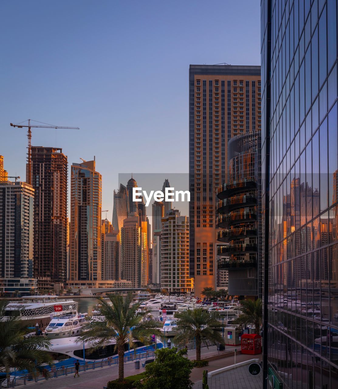 CITY BUILDINGS AGAINST CLEAR SKY