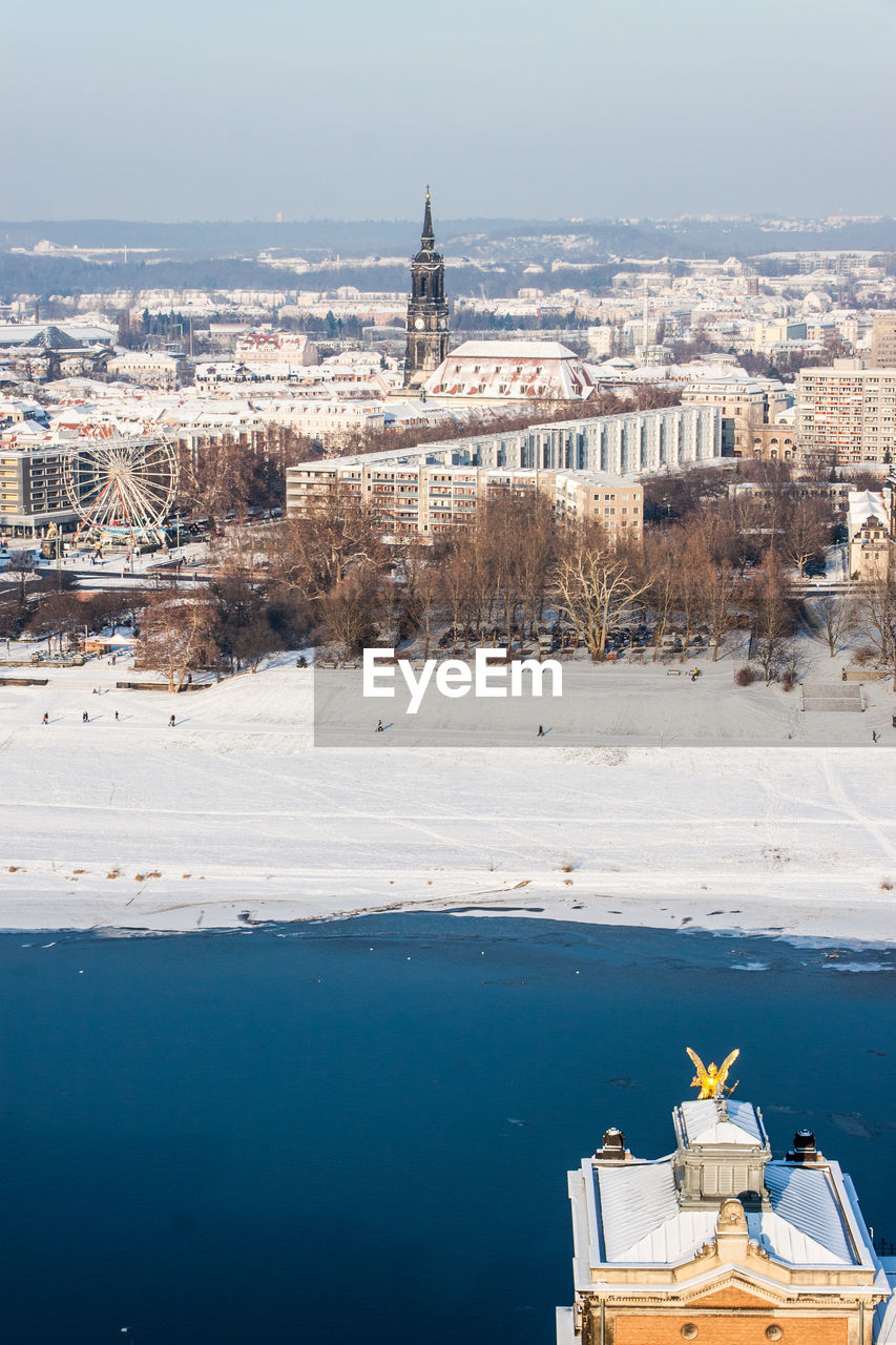 High angle view of cityscape by elbe river during winter