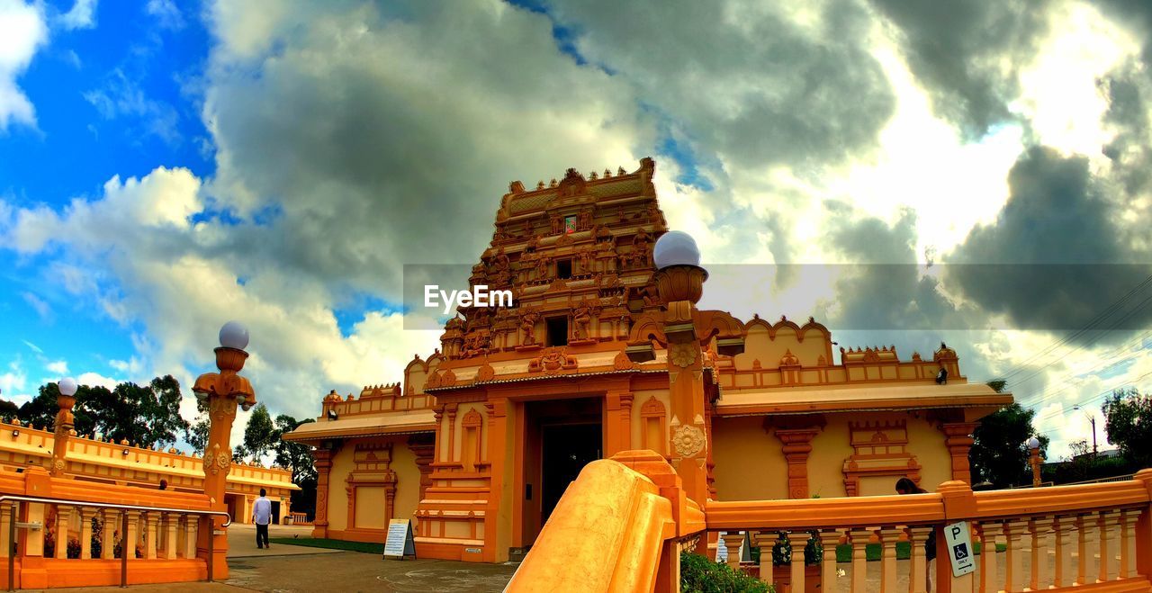 LOW ANGLE VIEW OF TEMPLE AGAINST SKY