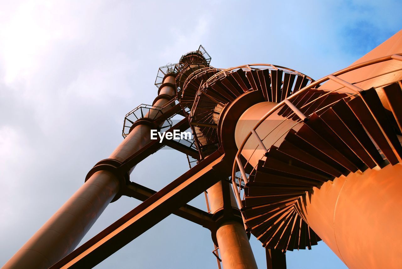 LOW ANGLE VIEW OF CAROUSEL AGAINST SKY