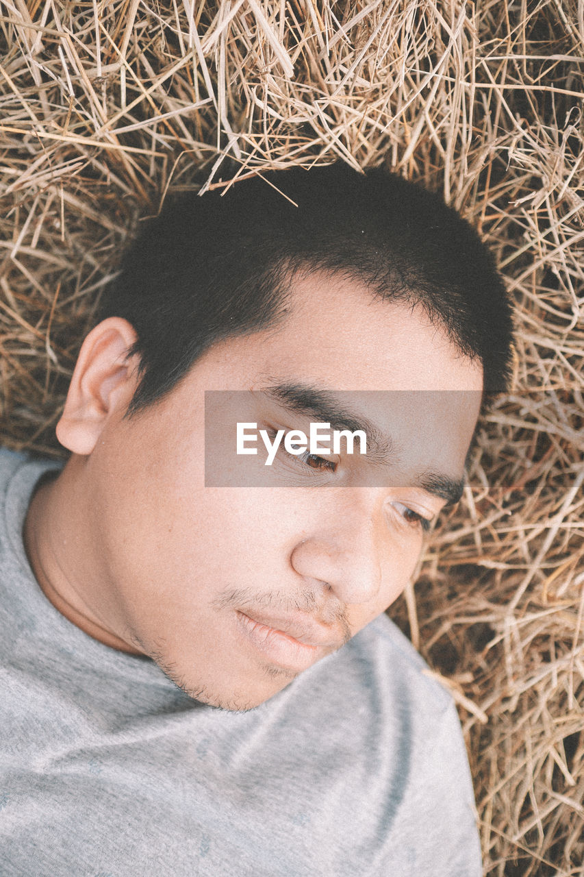 PORTRAIT OF A MAN WITH EYES CLOSED