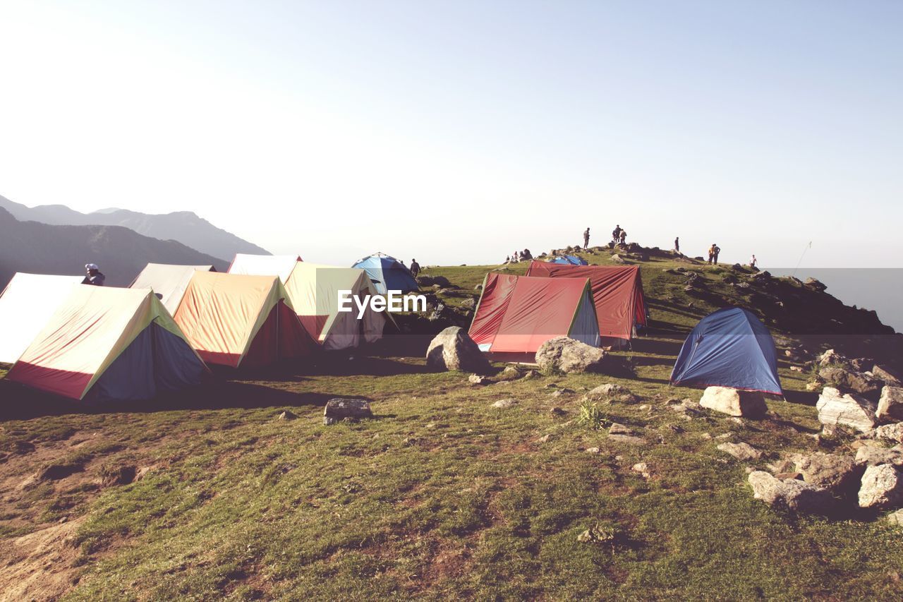 Tent on mountain against clear sky