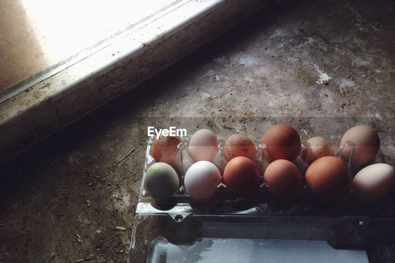 Variety of eggs in crate