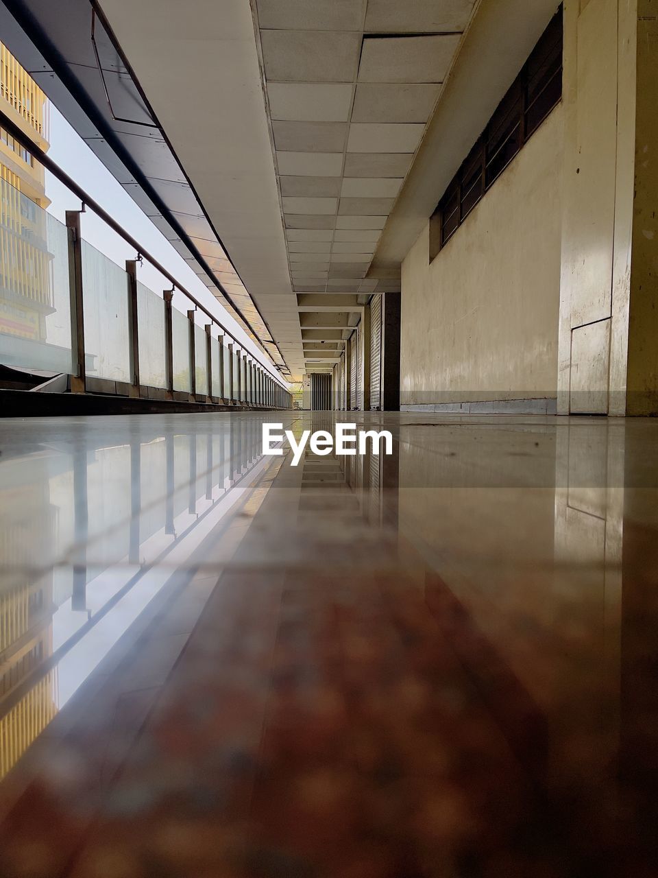 Surface level of empty corridor of building