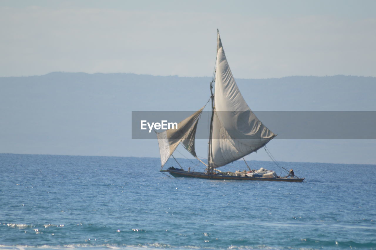 SAILBOAT IN SEA