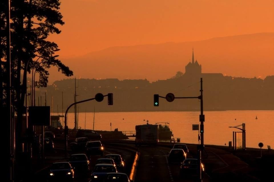 Traffic in street at dusk