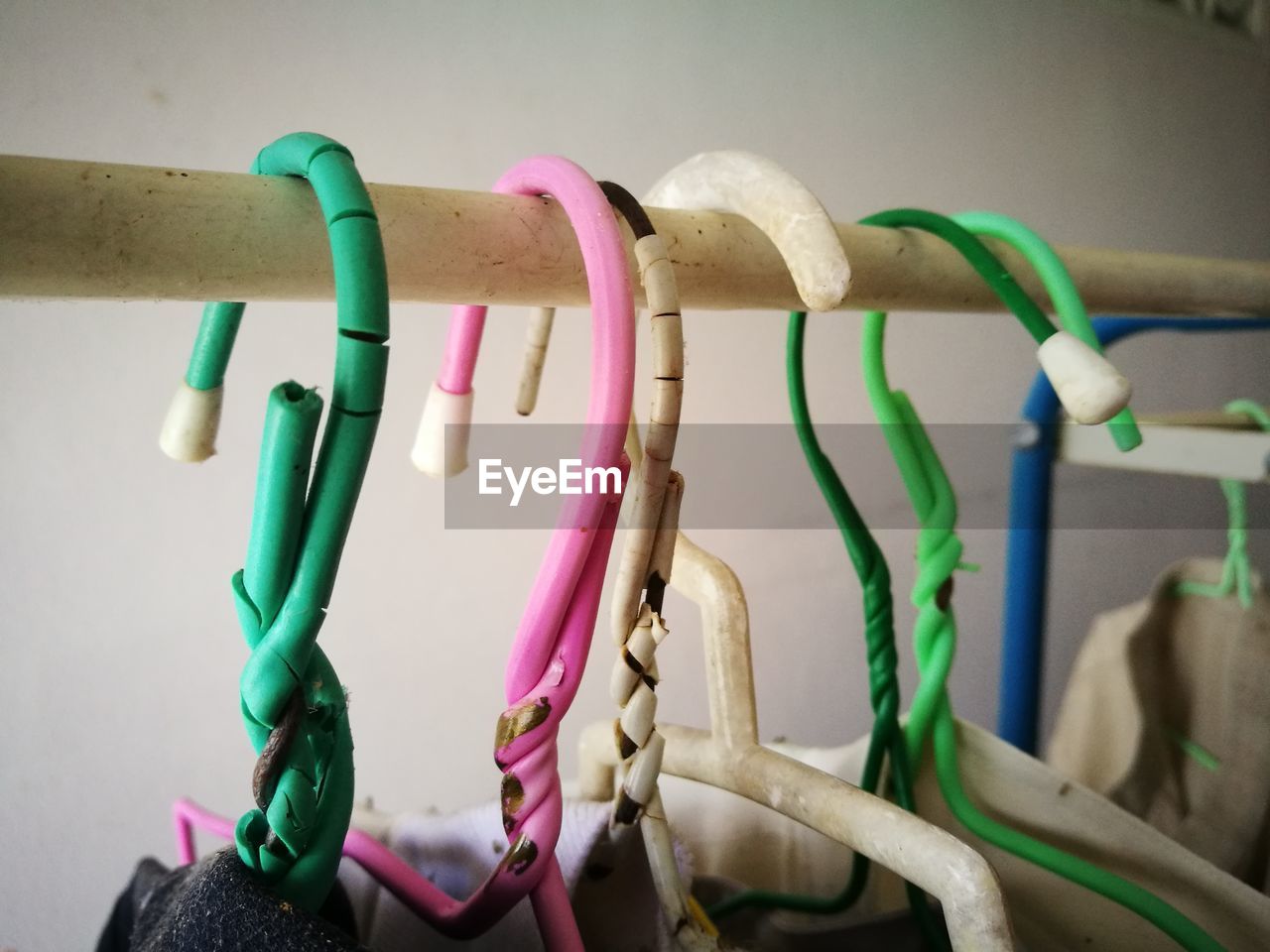 Close-up of multi colored hanging on clothesline