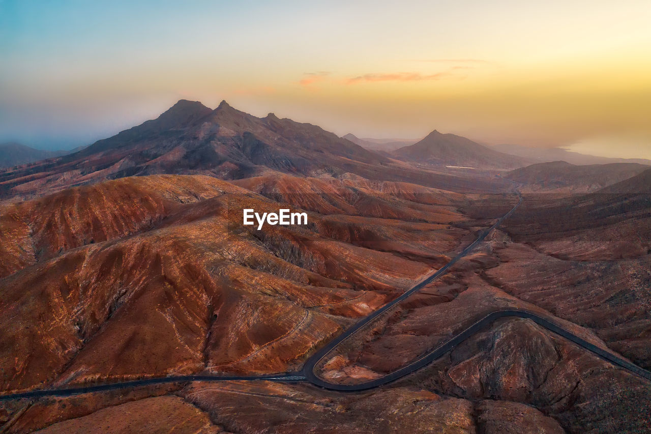 Aerial view of landscape during sunset