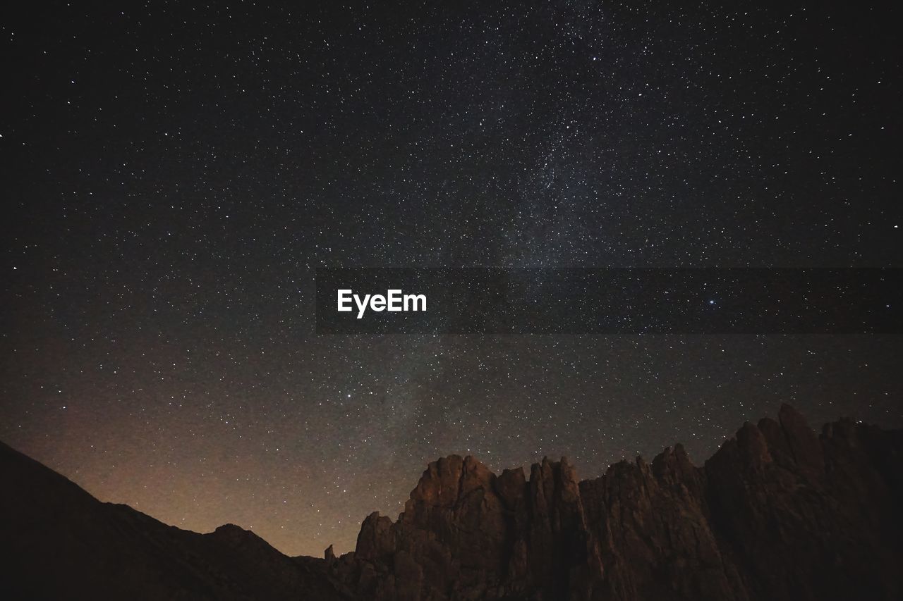 Low angle view of star field against sky at night