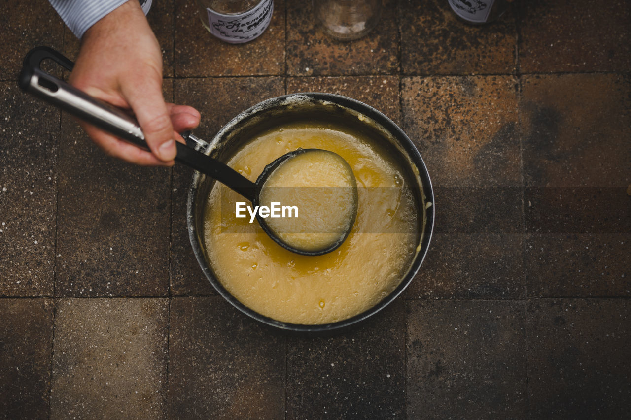 Cooking jam, filling glass bottles