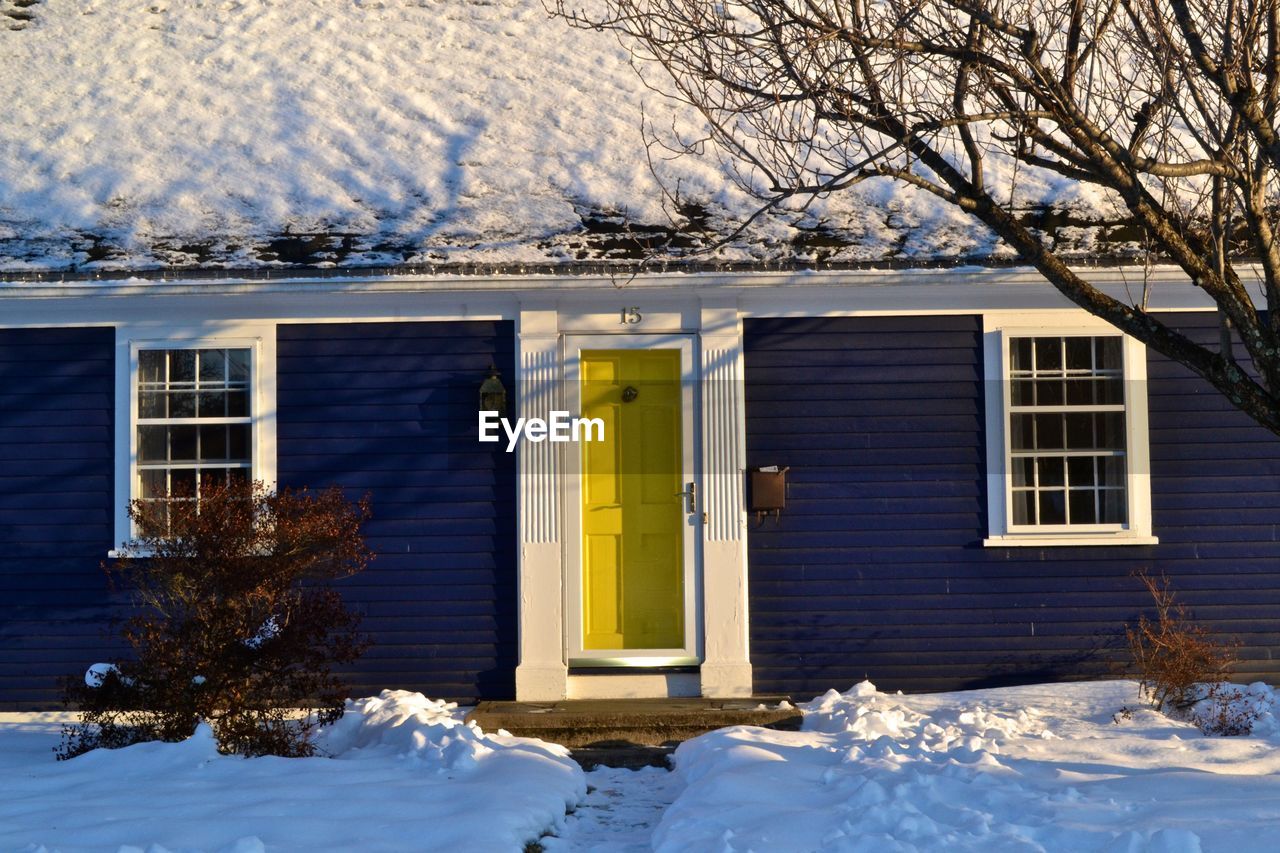 SNOW COVERED HOUSES IN THE WINTER