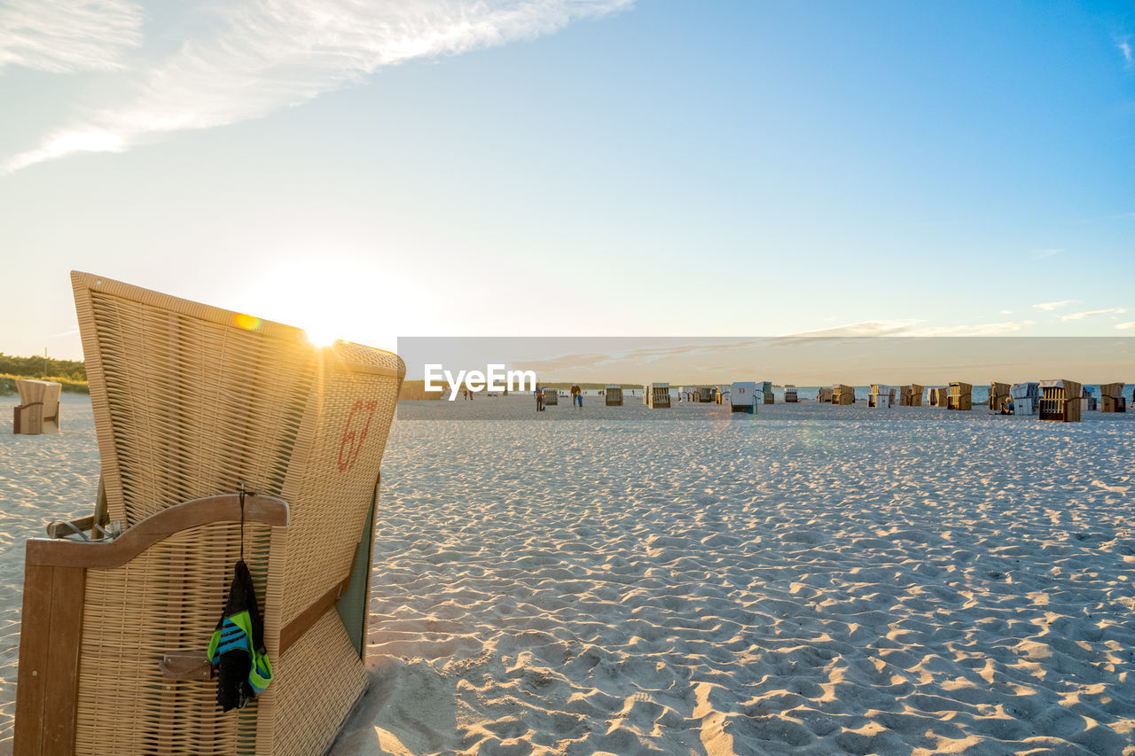 Scenic view of beach against sky during sunset