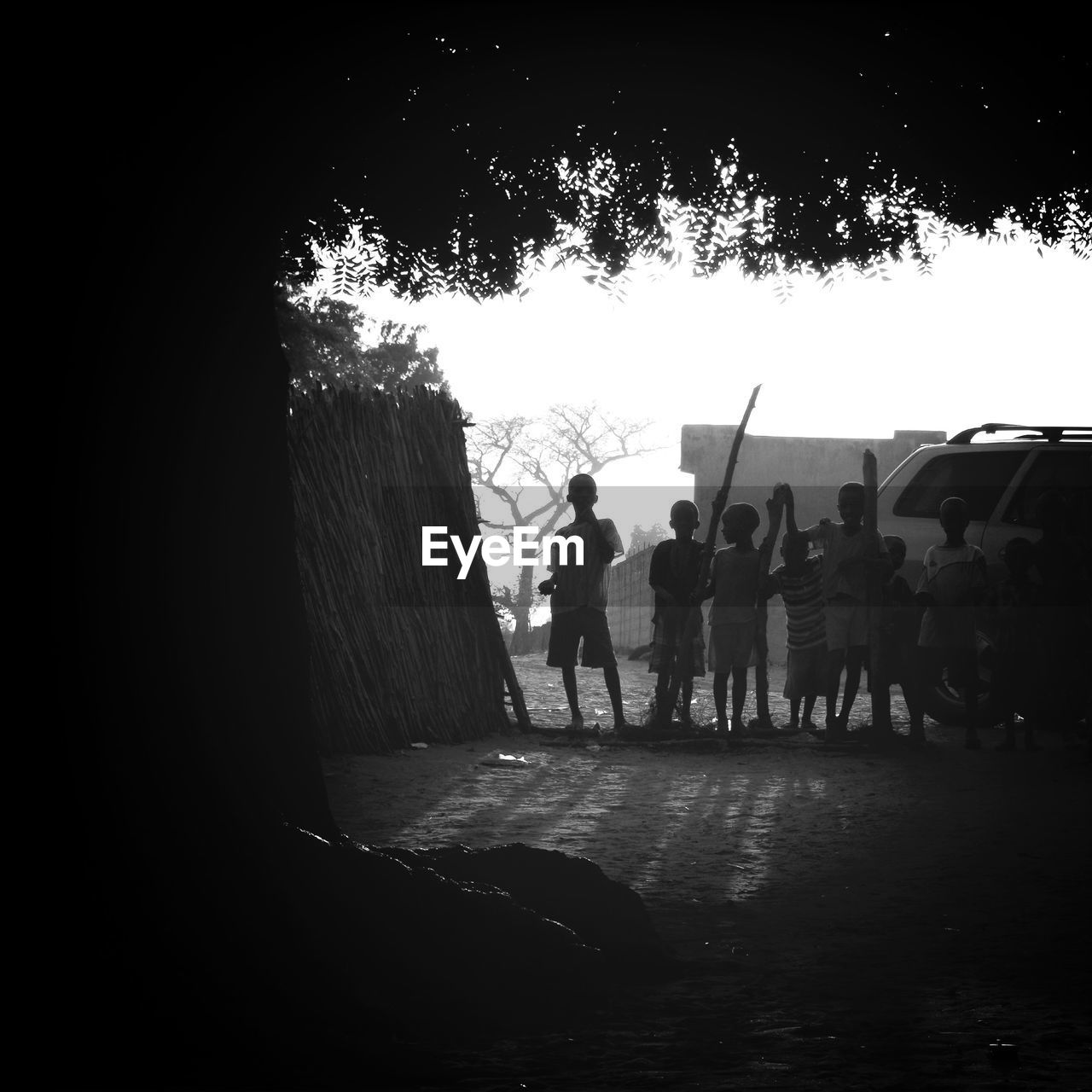 Silhouette of children in rural scenery