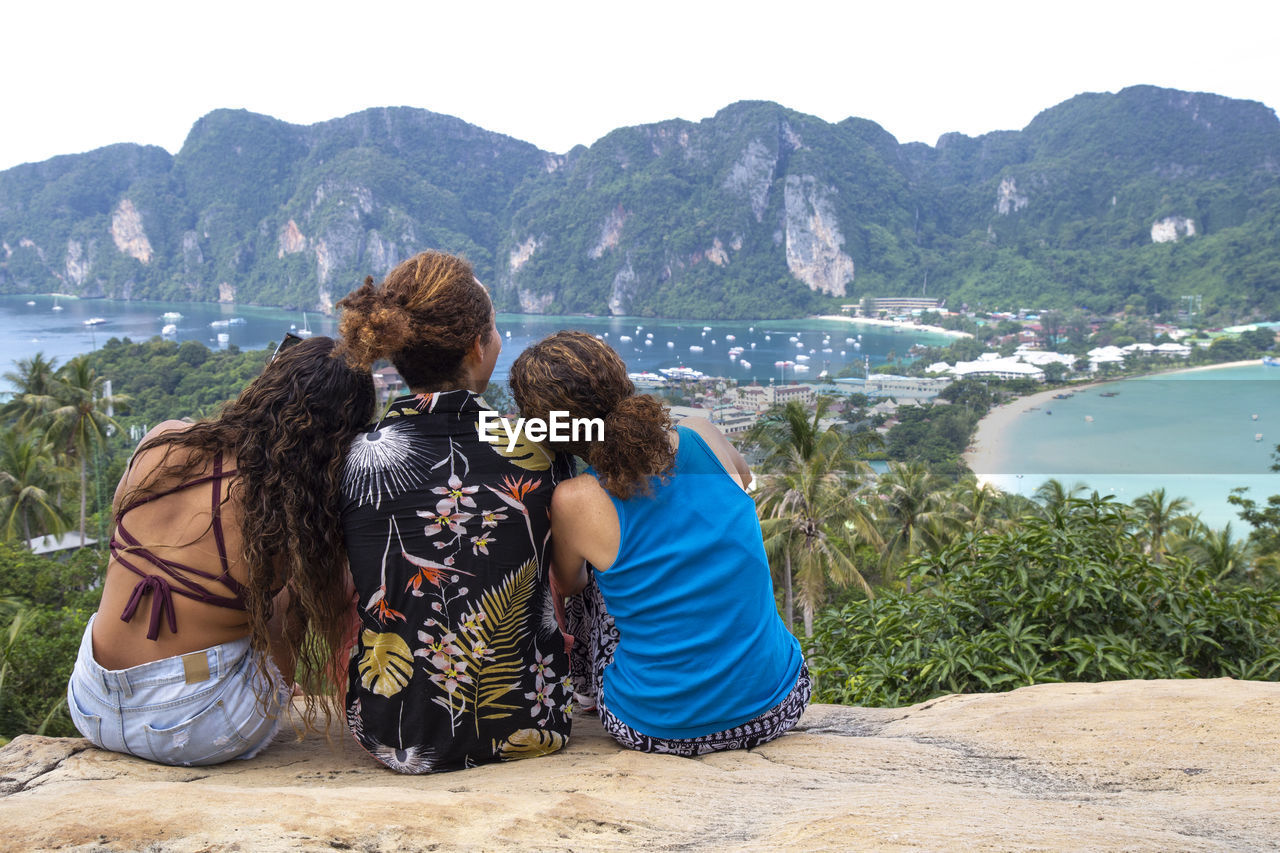 Mother, son and daughter at phi phi viewpoint, enjoying the view