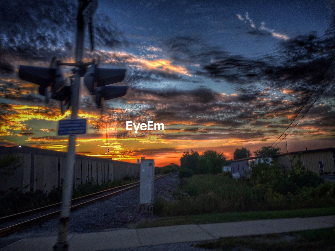 RAILROAD STATION PLATFORM AT SUNSET