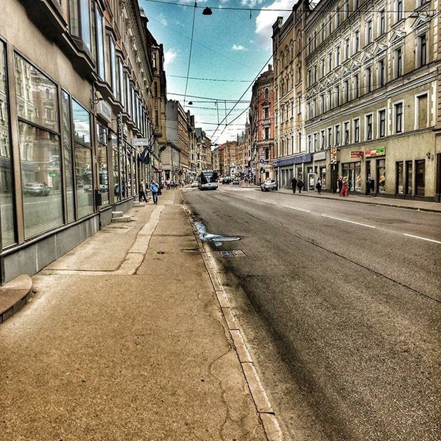 VIEW OF CITY STREET AND BUILDINGS