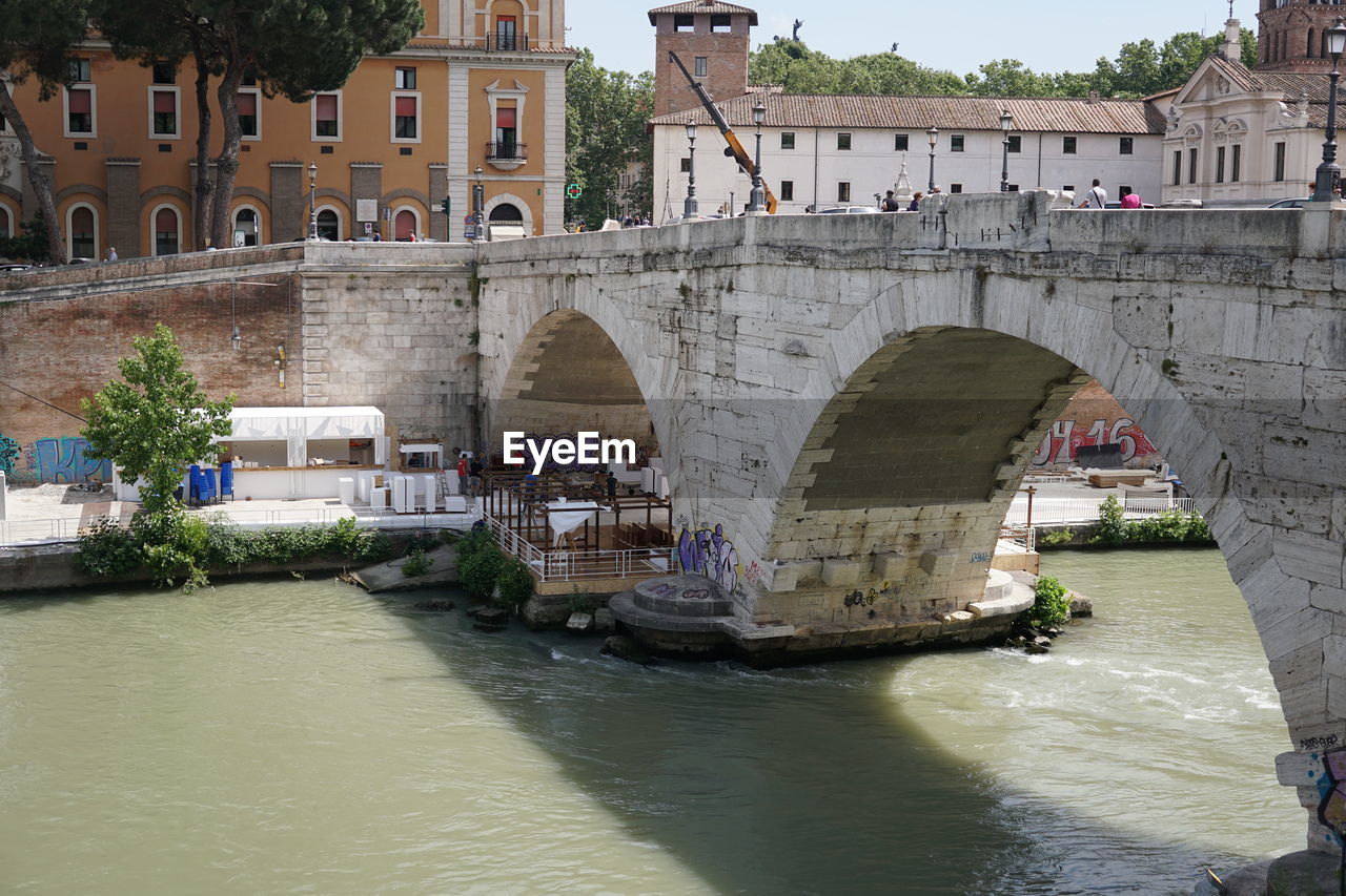 Arch bridge over river