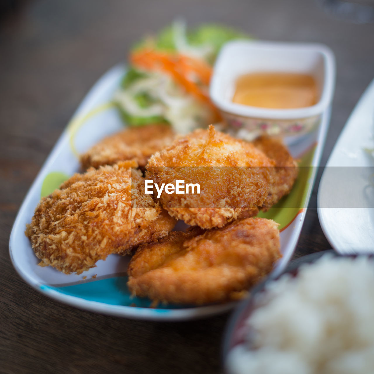 Close-up of fried food in tray on table