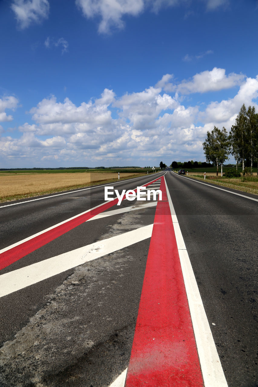 Surface level of road along countryside landscape