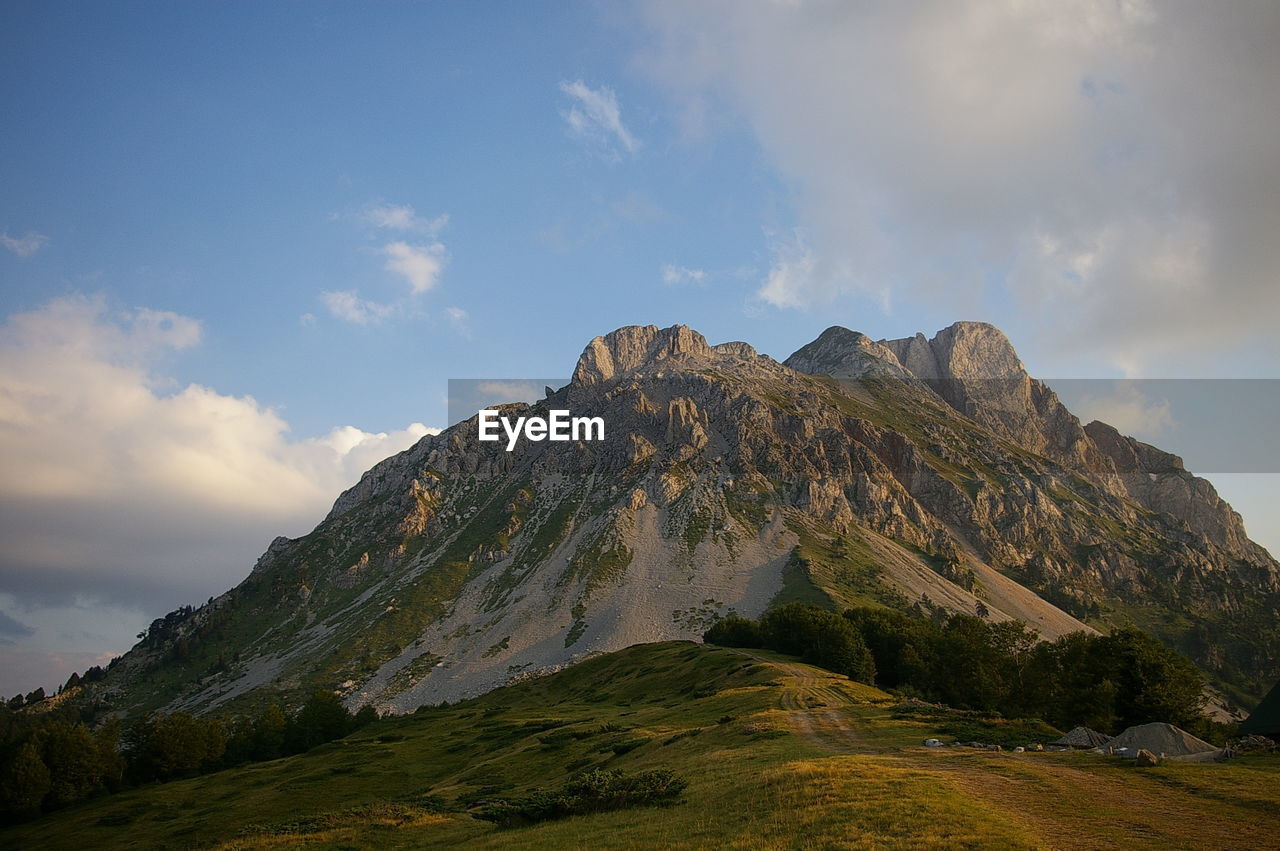 Scenic view of rocky mountains against sky