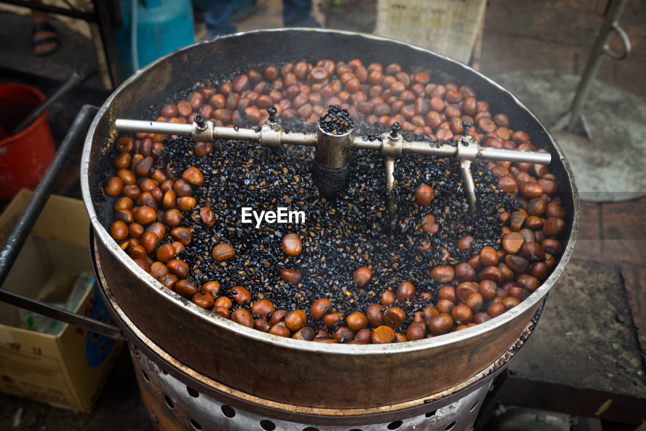 High angle view of chestnut in grinder