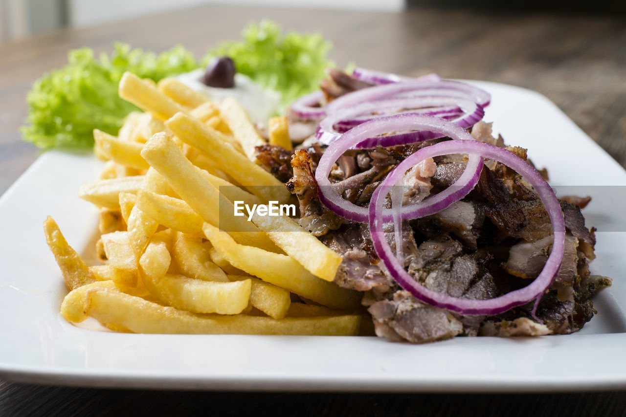 CLOSE-UP OF FOOD ON TABLE