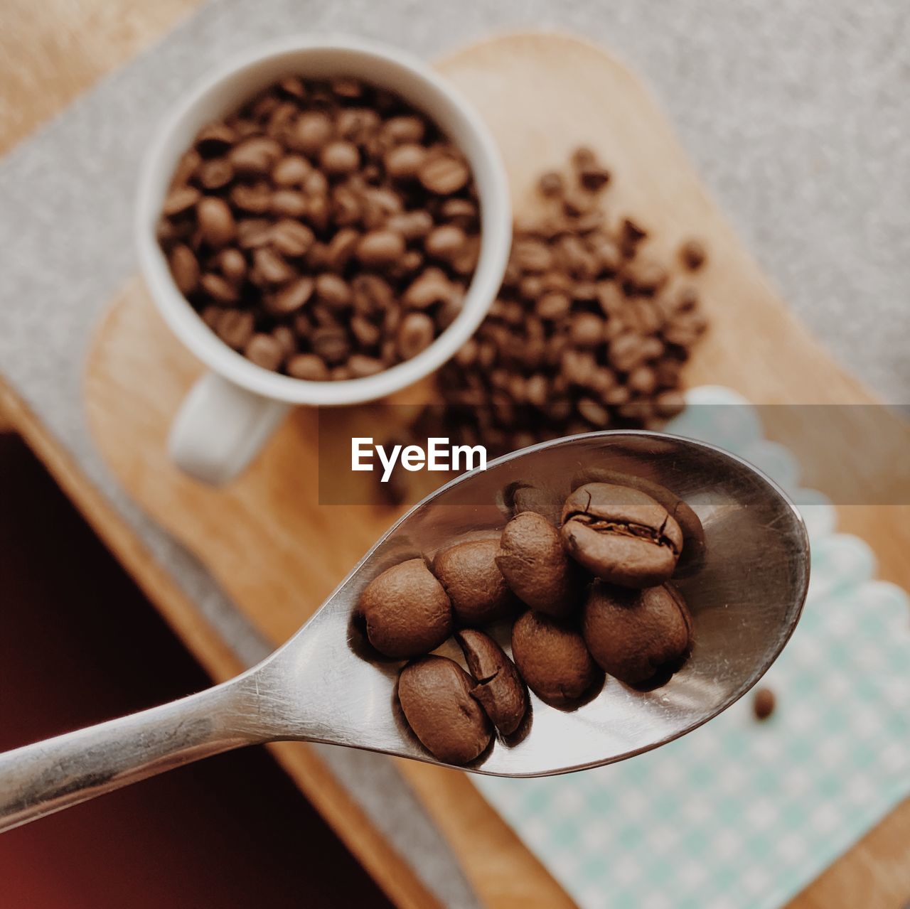 HIGH ANGLE VIEW OF COFFEE BEANS IN GLASS