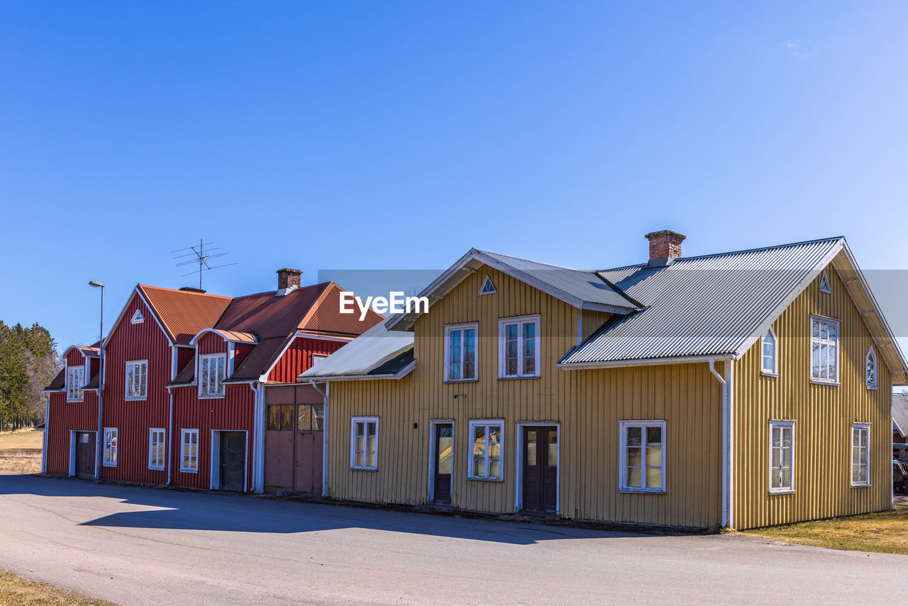 Old empty buildings on a street in a countryside village