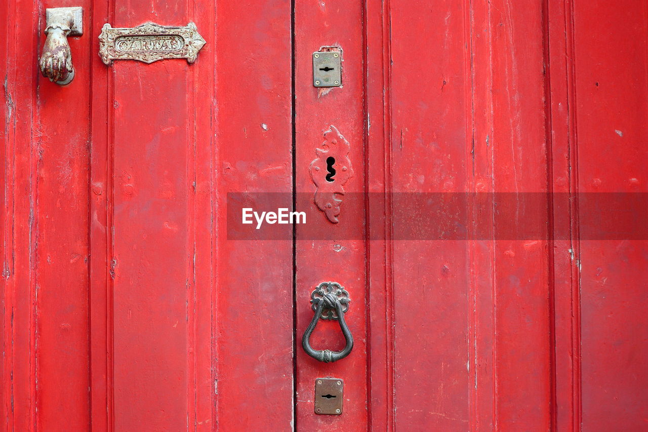 CLOSE-UP OF RED DOOR