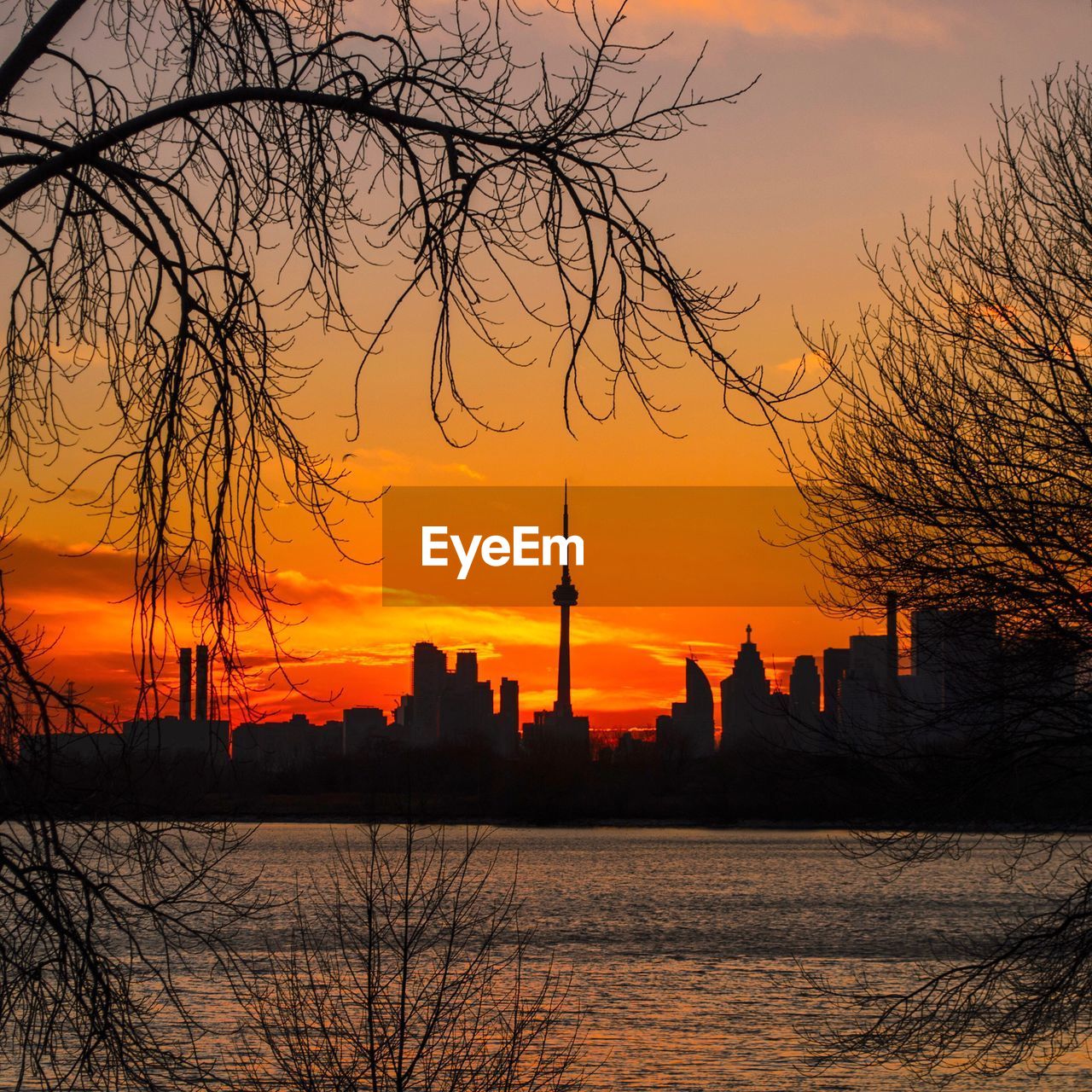 Silhouette of city during sunset