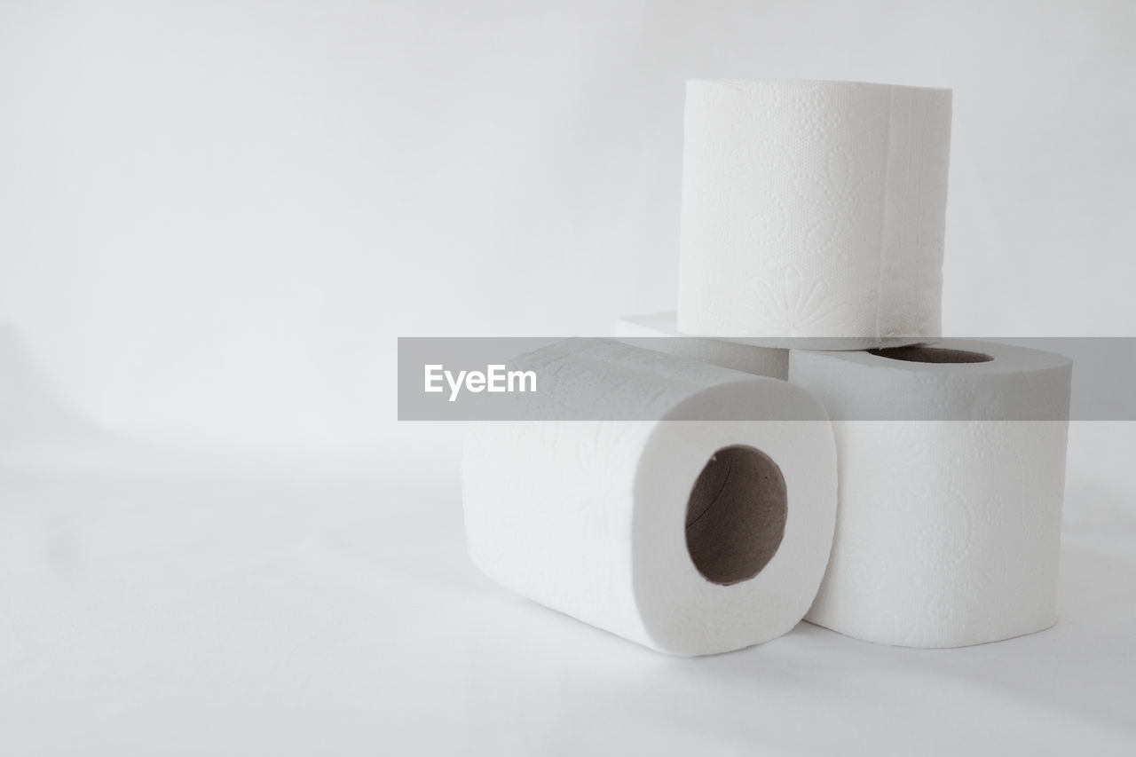 toilet paper, paper towel, paper, rolled up, cylinder, indoors, white, hygiene, no people, studio shot, copy space, white background, single object, domestic room, lighting, simplicity