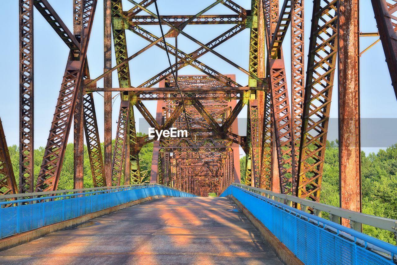 BRIDGE AGAINST BLUE SKY