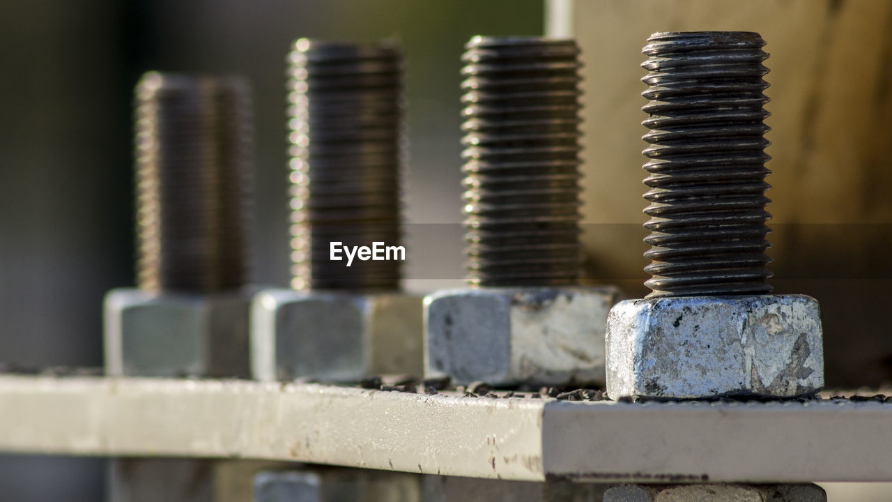 Close-up of nut and bolt on equipment