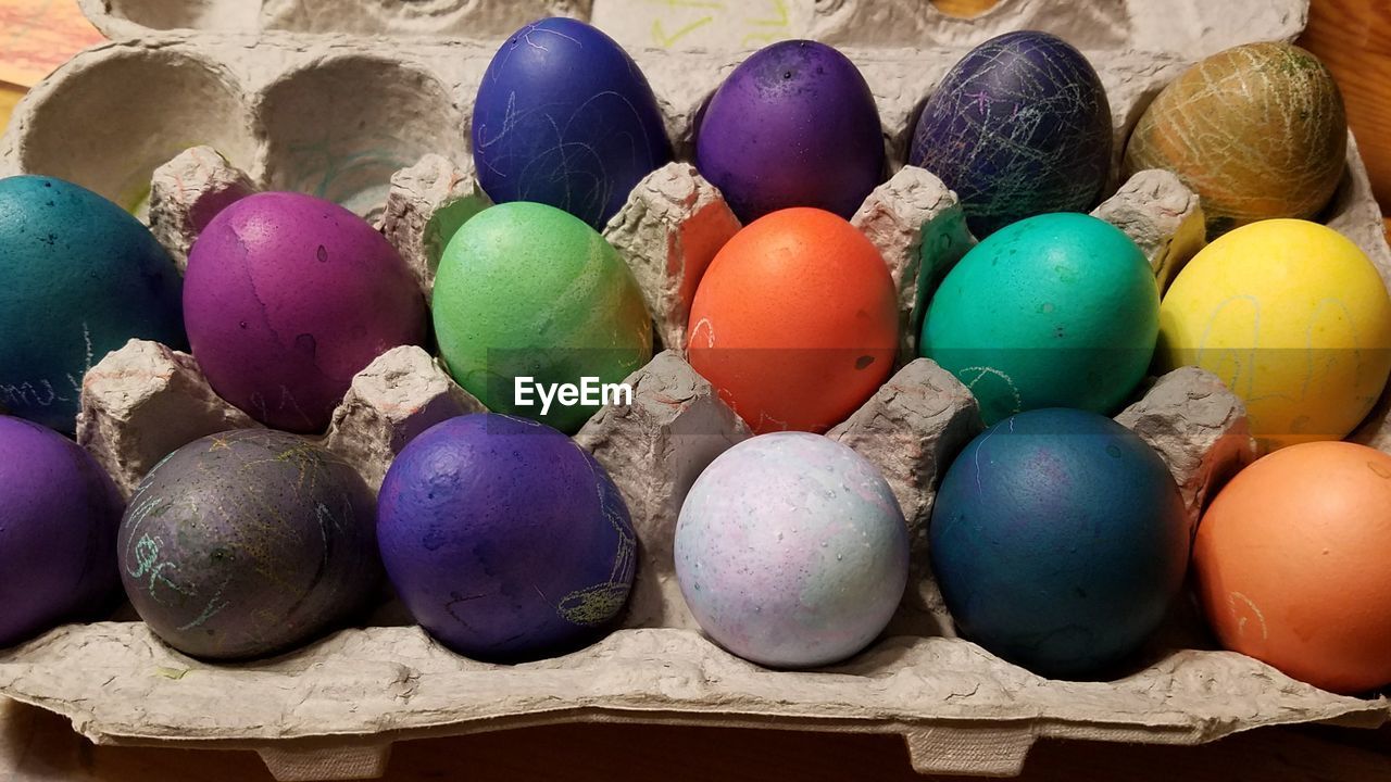 High angle view of multi colored eggs