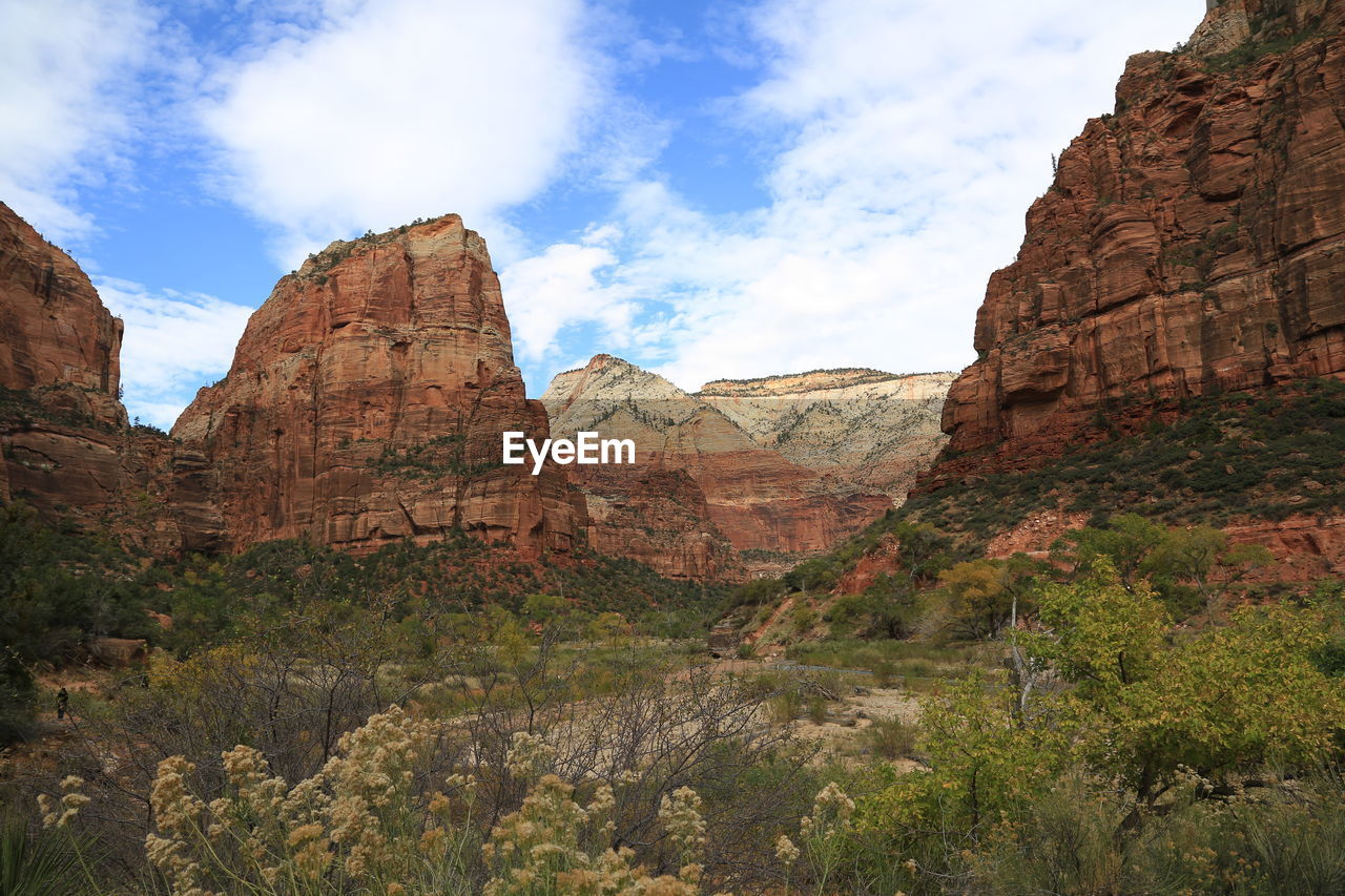 View of rocky mountains against sky