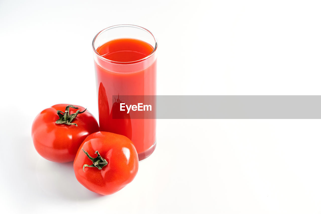 food and drink, food, healthy eating, red, tomato, fruit, wellbeing, juice, freshness, vegetable, household equipment, drinking glass, drink, refreshment, glass, cut out, white background, produce, studio shot, indoors, plant, soft drink, no people, copy space, plum tomato, still life, ingredient, organic