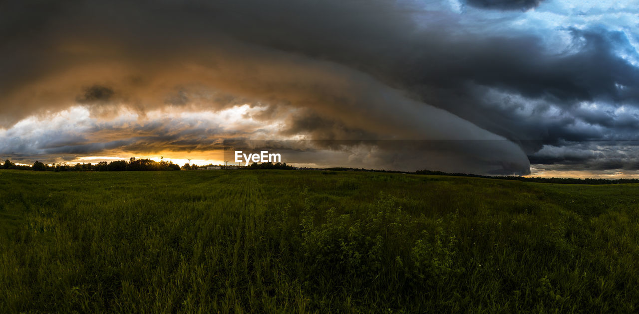 Scenic view of dramatic sky over land