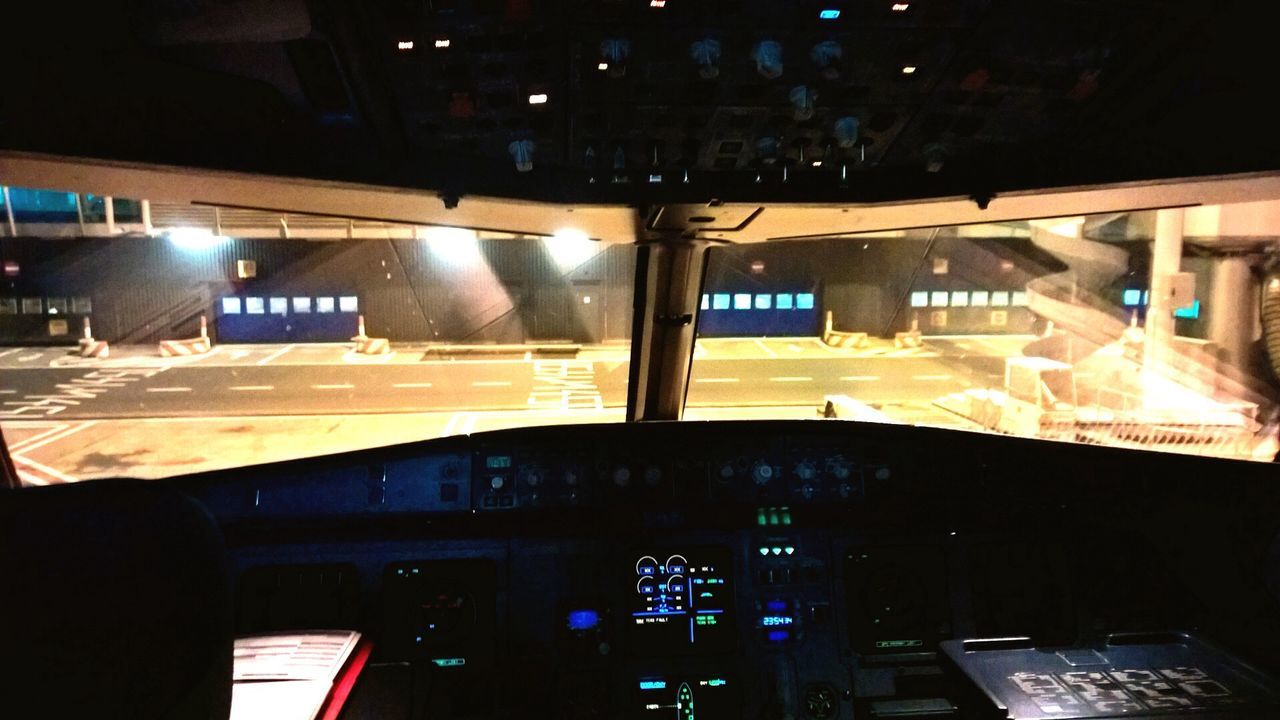 Airport seen from cockpit of commercial airplane
