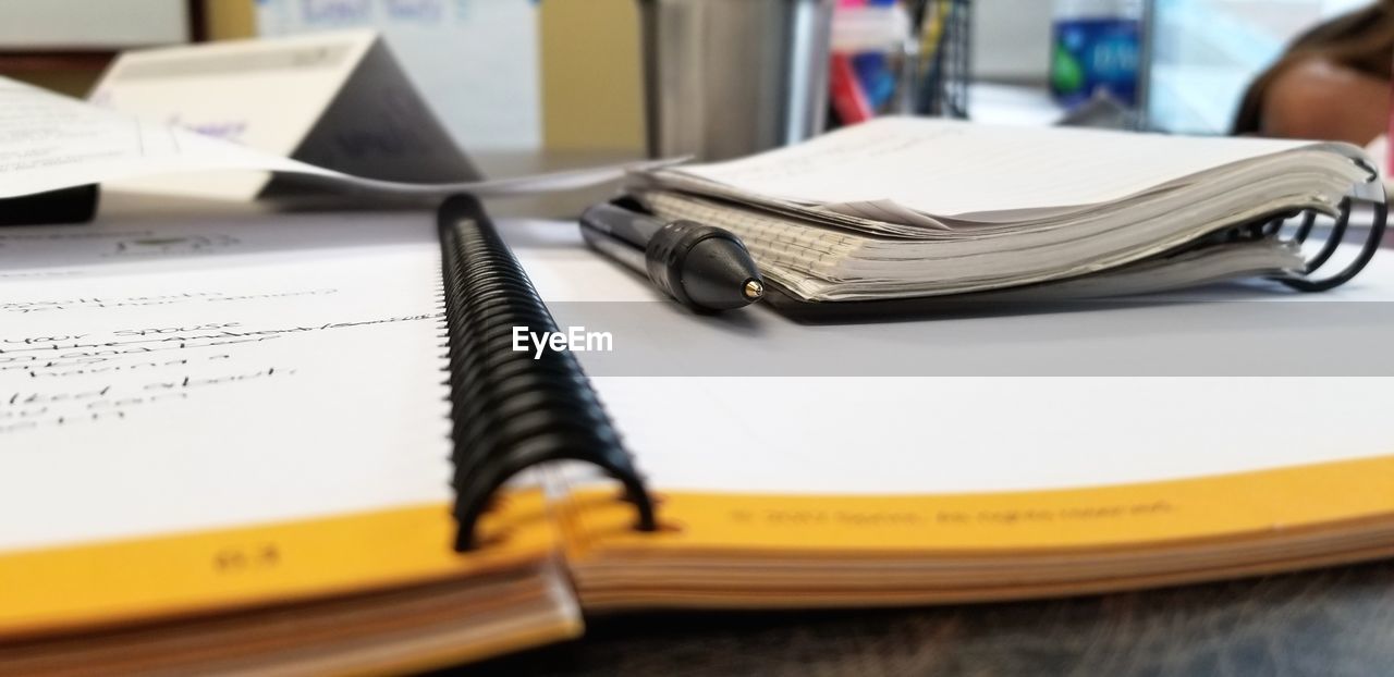 Close-up of open books on table