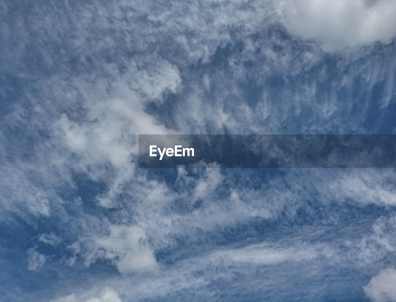 Low angle view of clouds in blue sky