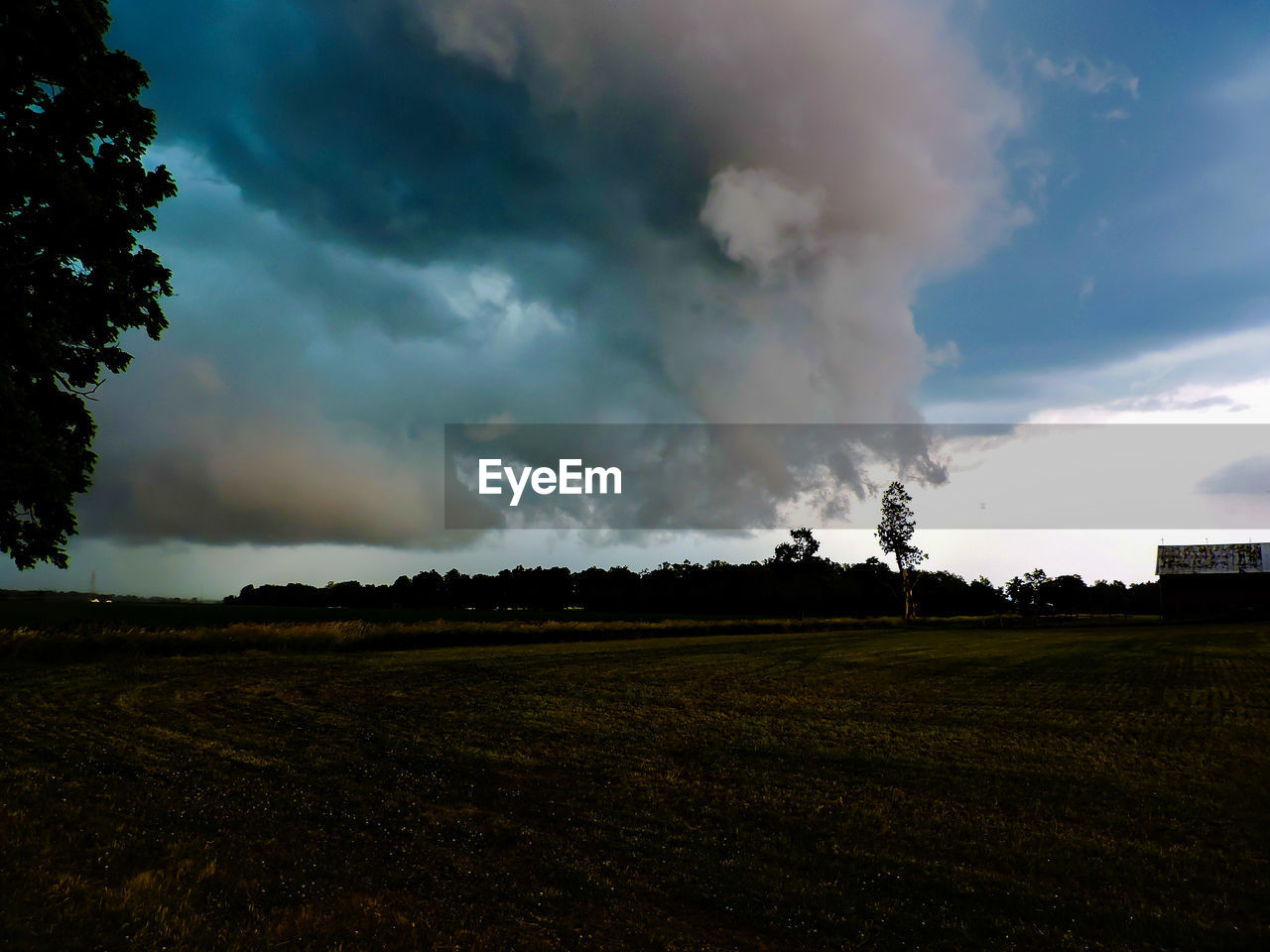 VIEW OF LANDSCAPE AGAINST CLOUDY SKY