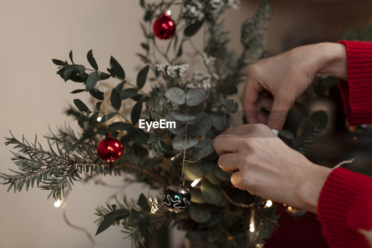 Hand holding christmas decoration