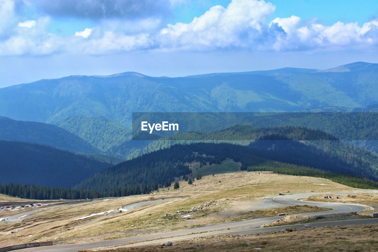 SCENIC VIEW OF MOUNTAIN RANGE AGAINST SKY