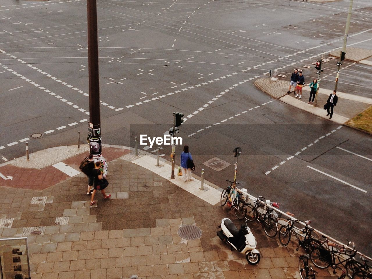 High angle view of people crossing road