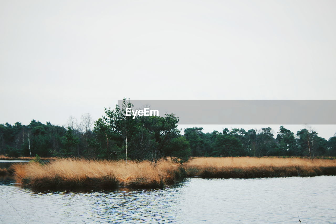 Scenic view of lake against clear sky