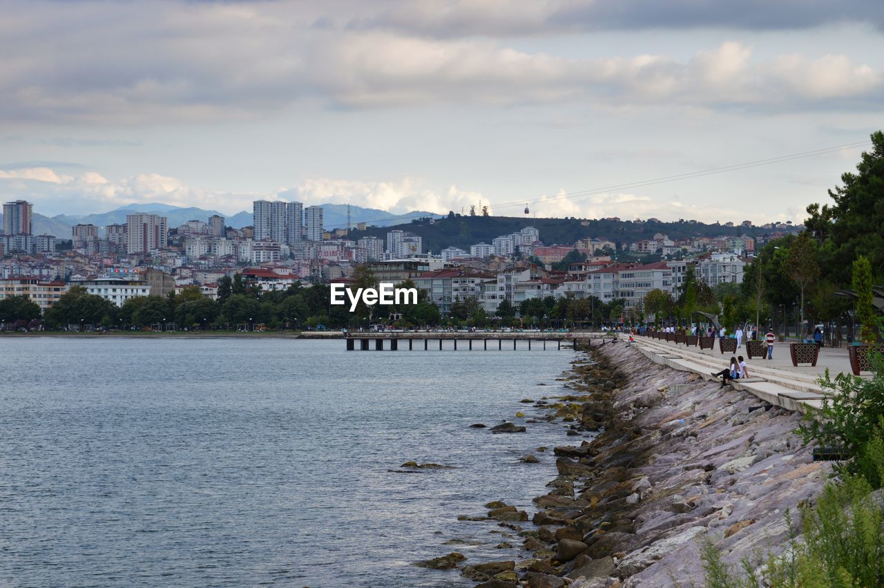 Buildings by sea against sky in city. ordu, turkey.