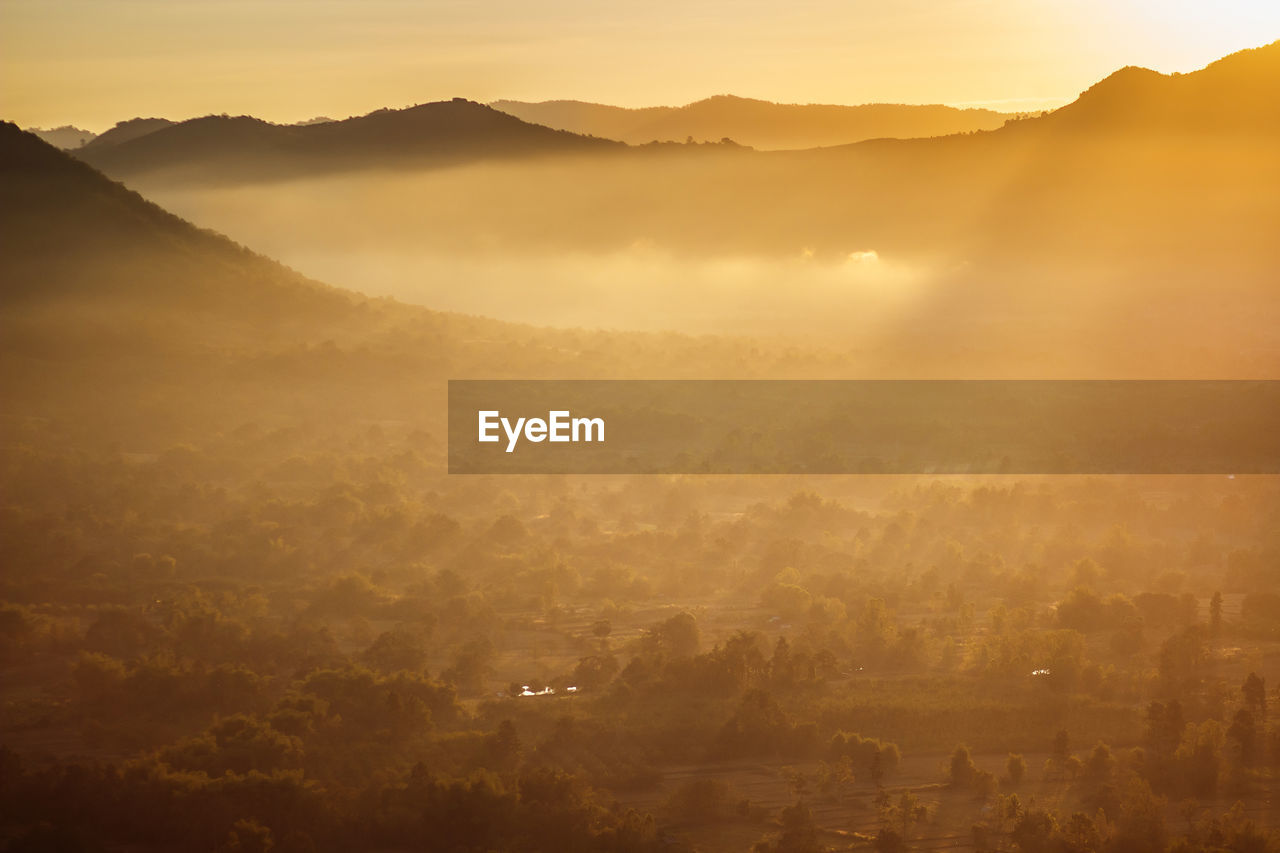 High angle view of cityscape against sky during sunset